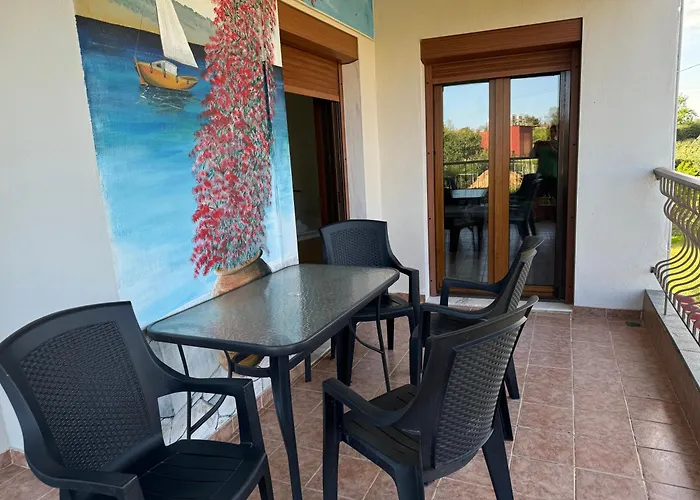 Caryatis Ntoridis & In Áfitos