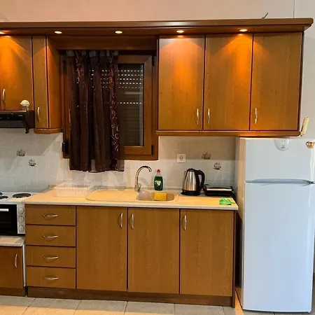 Caryatis Ntoridis & In Apartment *